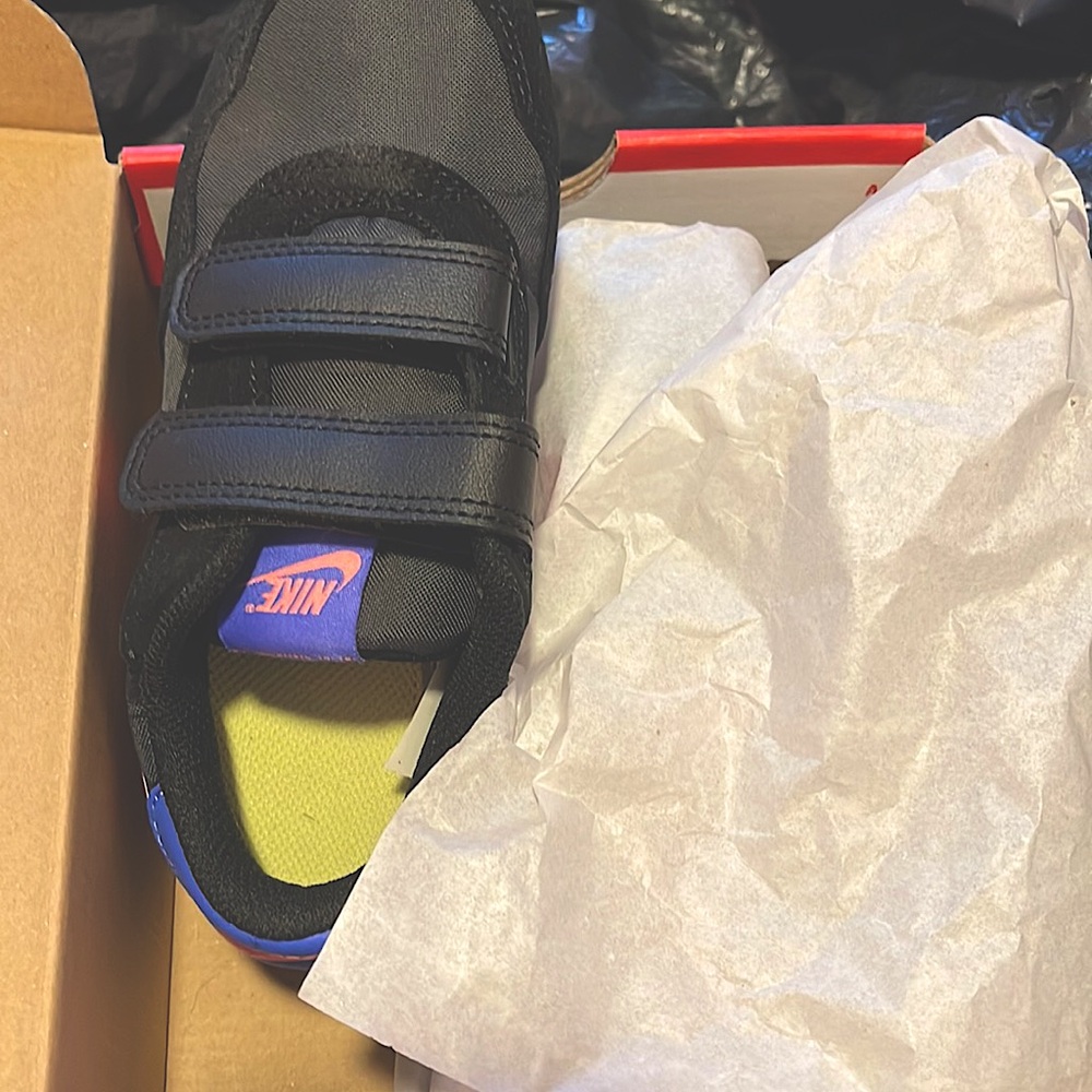 These are kids Nike sneakers new and nice for the summer.